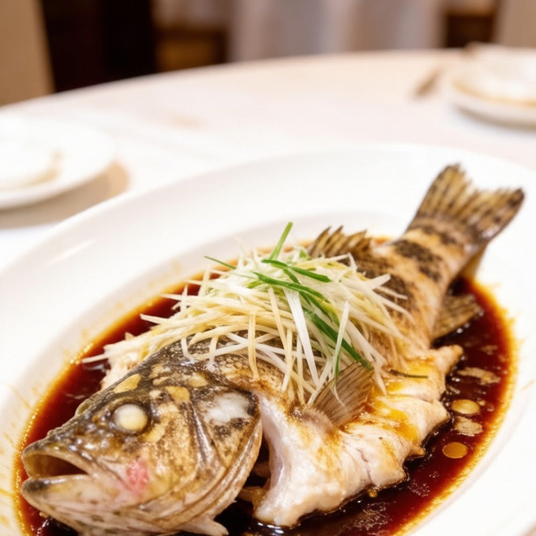 Steamed grouper topped with ginger and scallion
